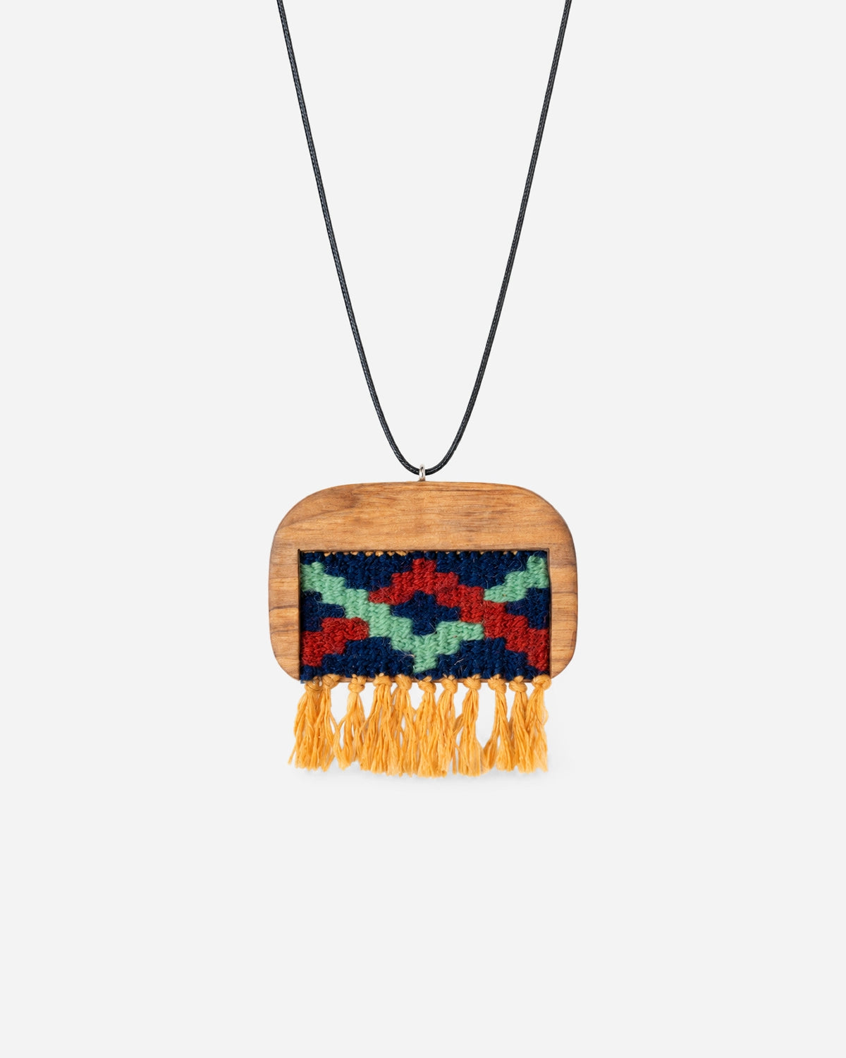Berry Zigzag Kilim Necklace with mint-green and berry-red weaving, a rounded walnut frame and mustard fringe on a black cord.