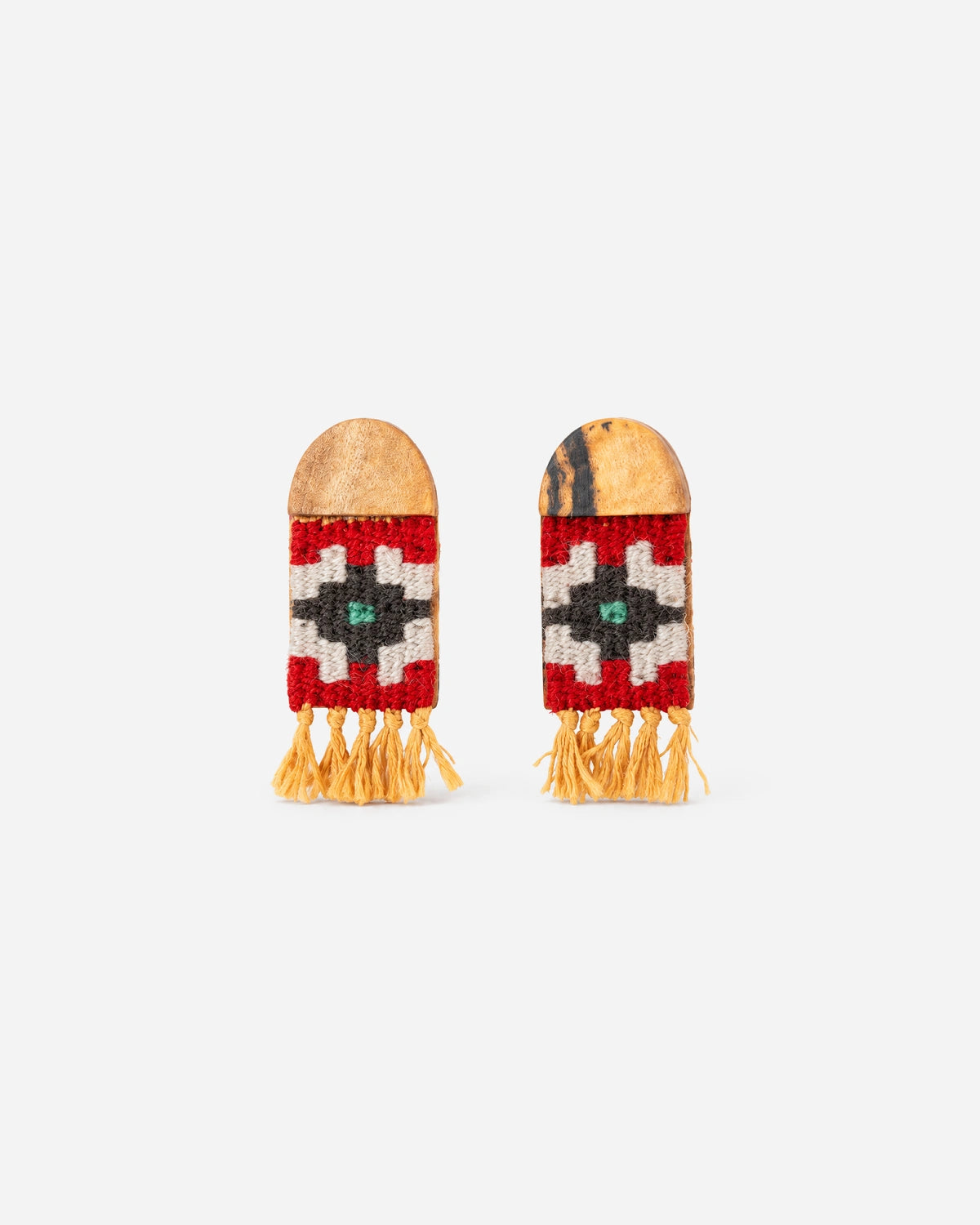 Saffron Dome Kilim Earrings with red, cream and charcoal weaving, rounded walnut caps and mustard fringe.